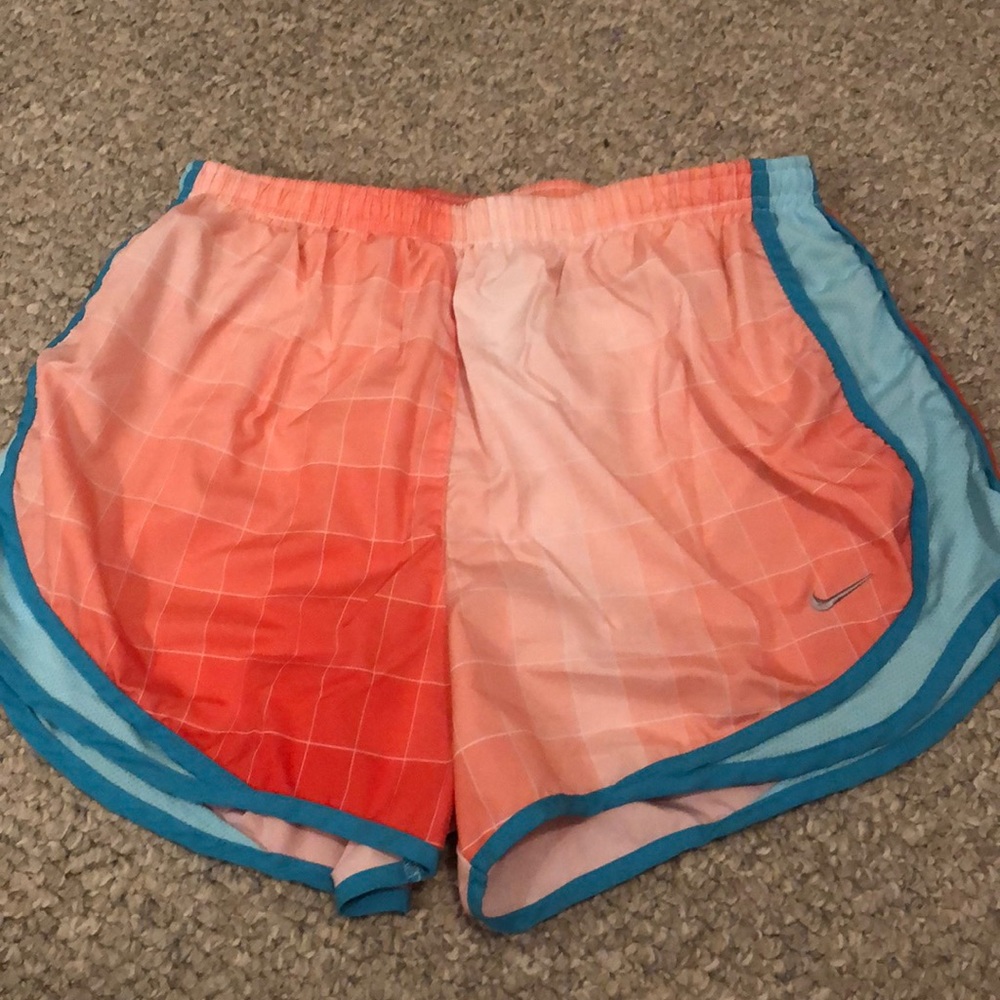 orange and blue nike shorts